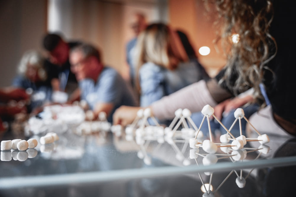 A corporate team doing a problem solving activity