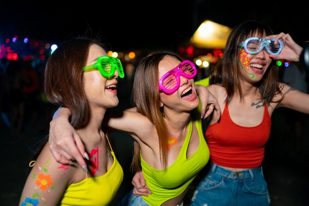 A group of friends having fun at the Phuket full moon party