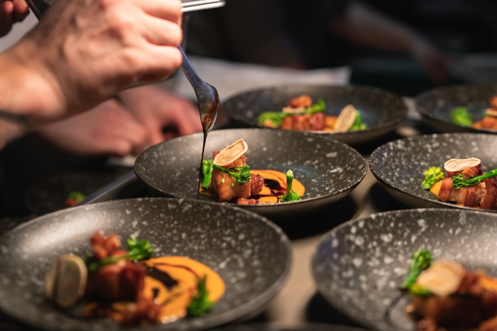 Chefs preparing food at a Michelin star restaurant in Phuket 