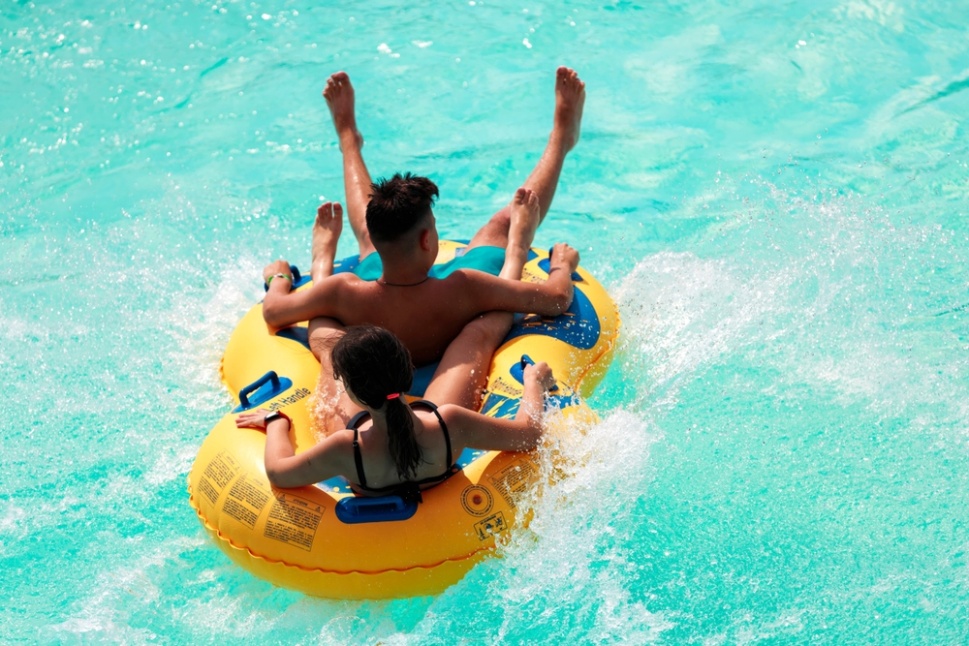Friends having fun at a water park in Phuket 