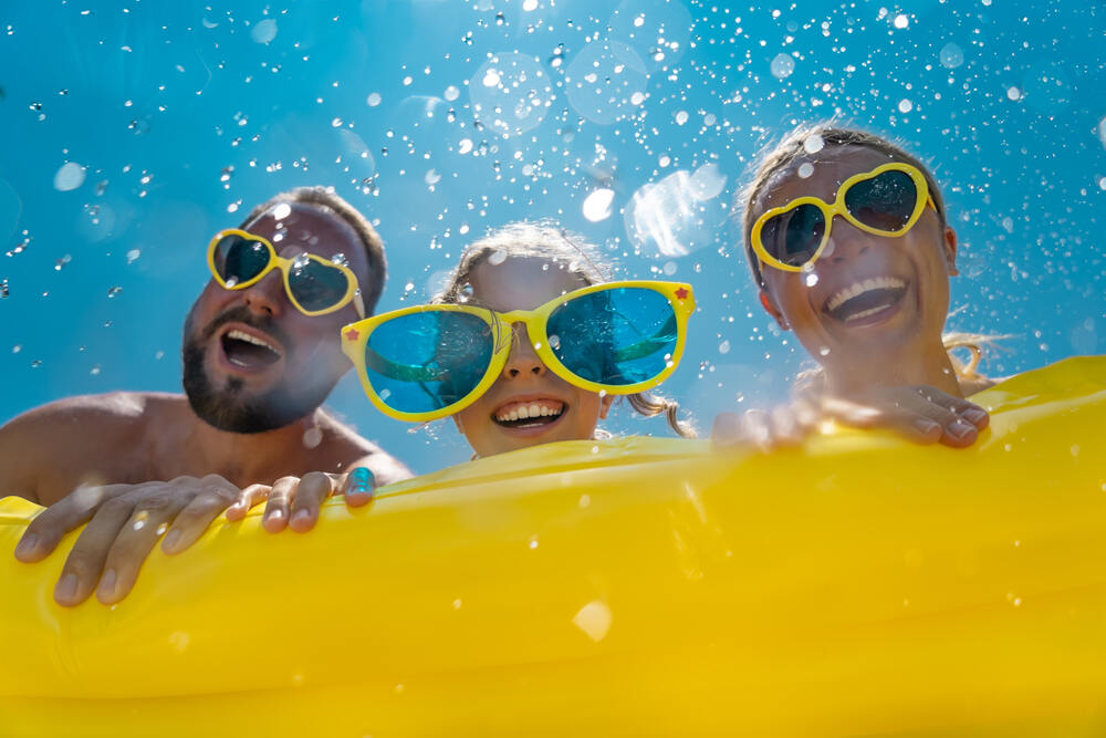 Happy family enjoying a water ride