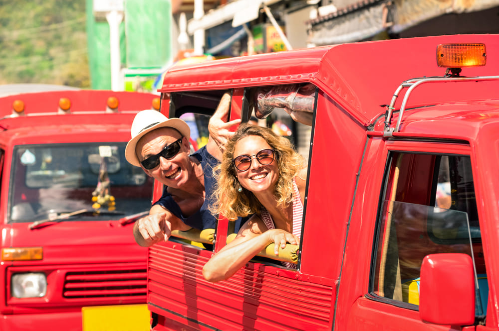 Tourists having fun in a tuk tuk in Phuket